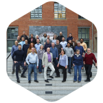 The friendly faces of the entimo team gathered in the office atrium.